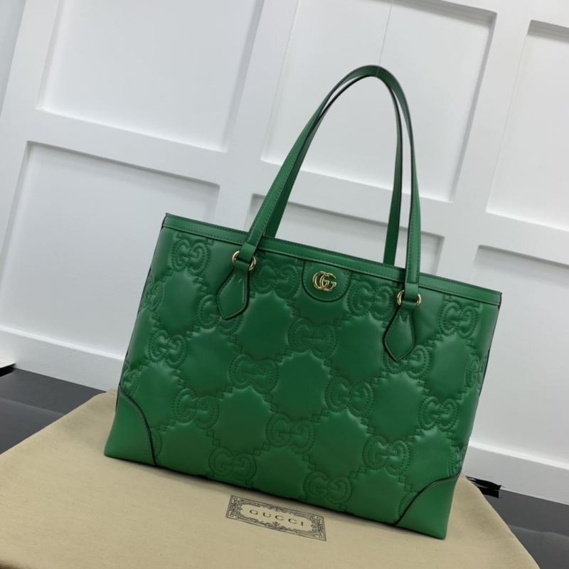 G*u*i shopping bags